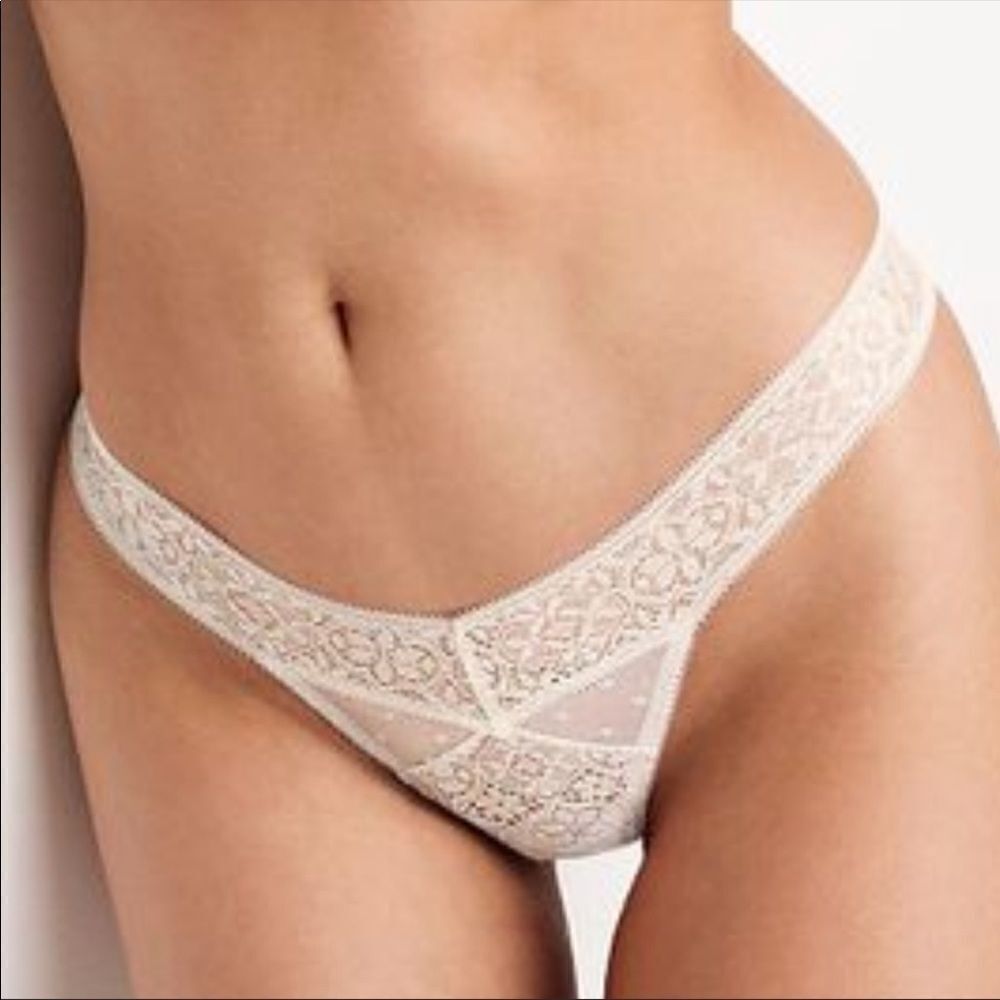 Victoria’s Secret sexy coconut white lace thong M
